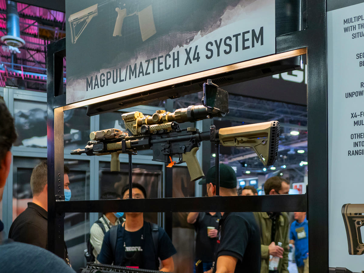 AR-15 with Magpul stock and grip displayed on the Magpul stand