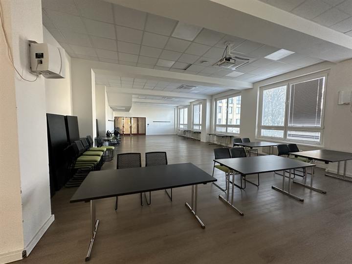 Long meeting room with a window wall