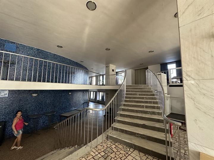 Stairwell with a mosaic wall