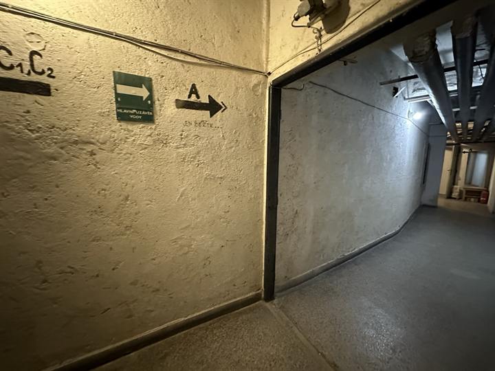 Marked shelter corridor with escape routing