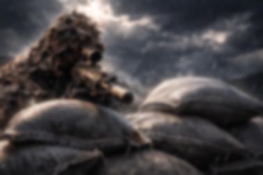 Concealed firing position behind sandbags