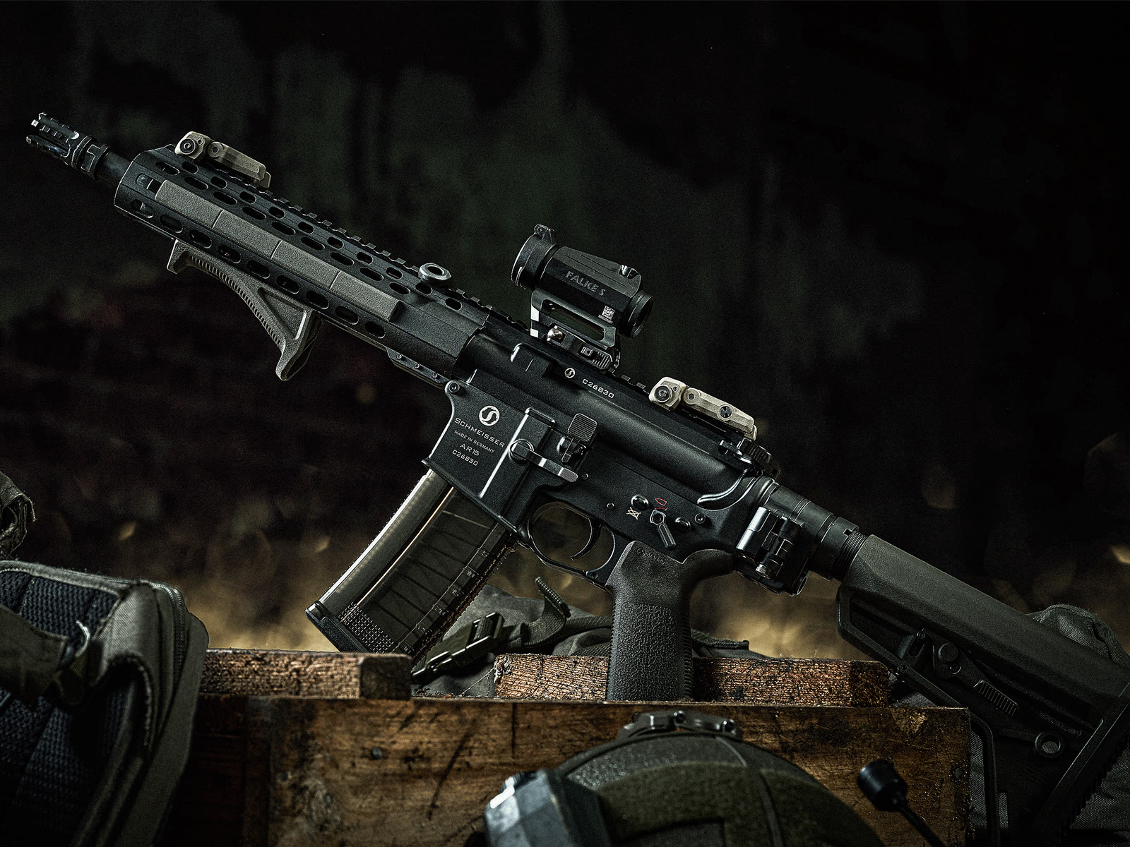 AR15-platform rifle with Magpul furniture on an ammunition crate