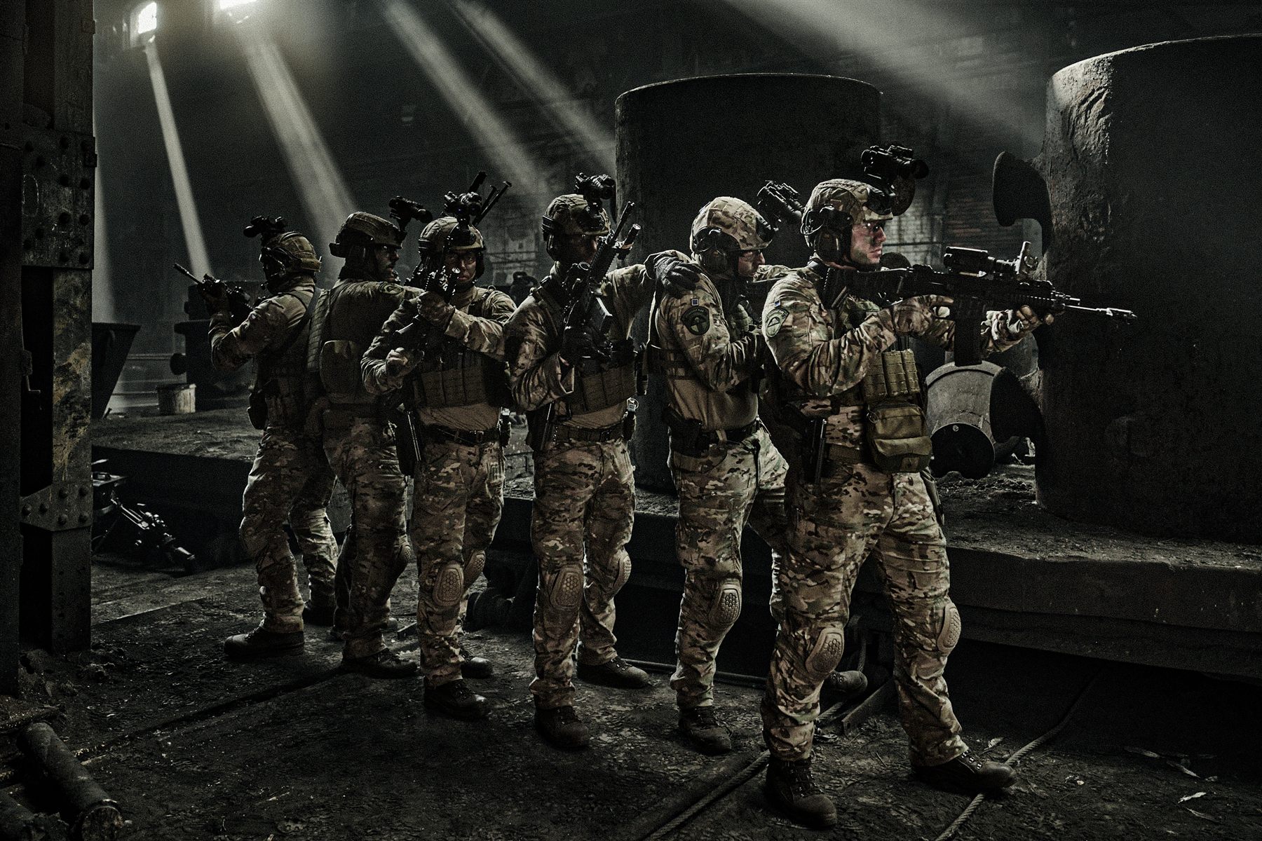 Team in full kit in an industrial hall